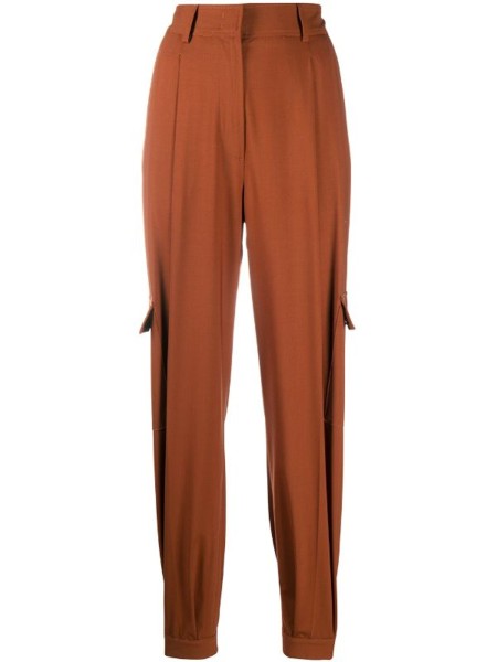 Shop MSGM Sales Pants: Pants MSGM, high waist, in cool wool, zip and button closure, 2 lateral pockets, 2 front pockets near knees, cuffs at the end, in rust color.

Composition: 100% wool.